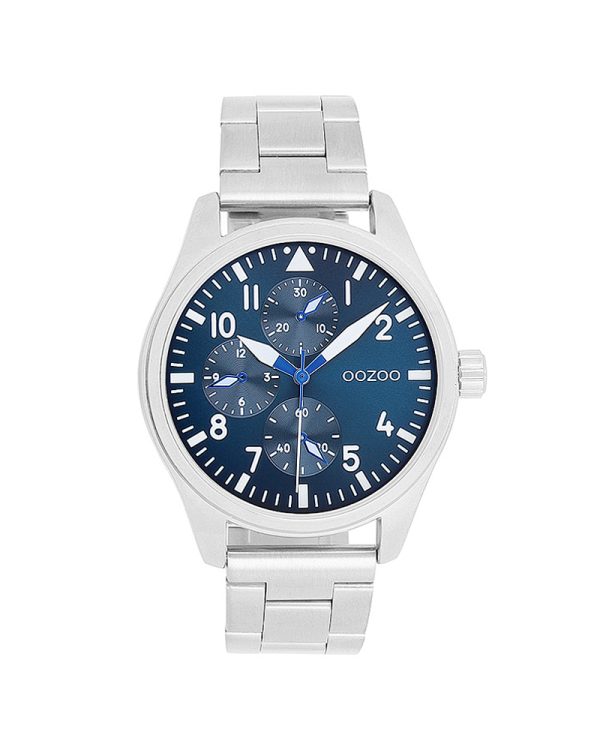Το OOZOO bestseller C11505 είναι ένα κομψό ανδρικό-unisex ρολόι με μπλε καντράν και ασημί ανοξείδωτο μπρασελέ. Διαθέτει κάσα 42mm, quartz μηχανισμό και mineral κρύσταλλο, αποτελώντας μια μοντέρνα και καθημερινή επιλογή με fashion-σπορ χαρακτήρα.