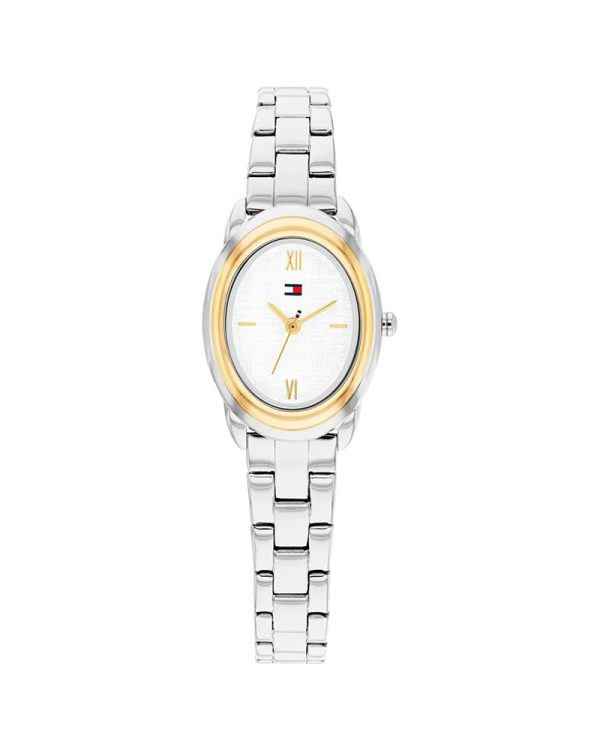 Γυναικείο ρολόι Tommy Hilfiger Demi 1782874 με οβάλ κάσα 19.7mm από ανοξείδωτο ατσάλι, χρυσή κάσα, ασημί μπρασελέ από ανοξείδωτο ατσάλι, λευκό καντράν με χρυσούς δείκτες, ορυκτό κρύσταλλο ειδικής σκλήρυνσης, Quartz μηχανισμό και αδιαβροχοποίηση 3 ATM / 30 μέτρα.